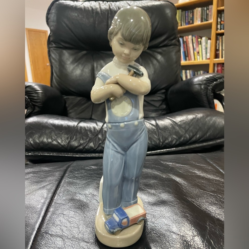 Lladro retired mechanic boy with hammer, dice & truck vintage figurine